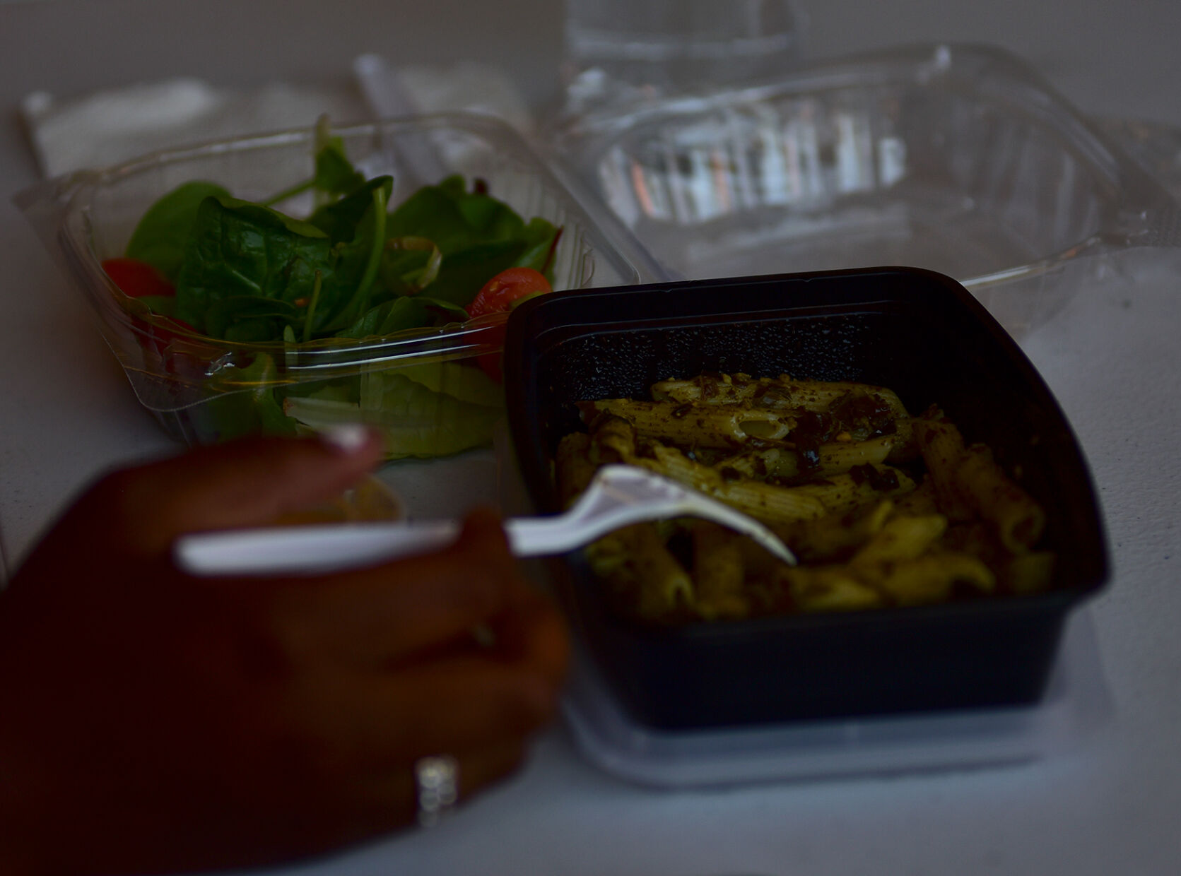 Amissa Blumenthal, a freshman at MU, eats penne pesto during Kol Nidre